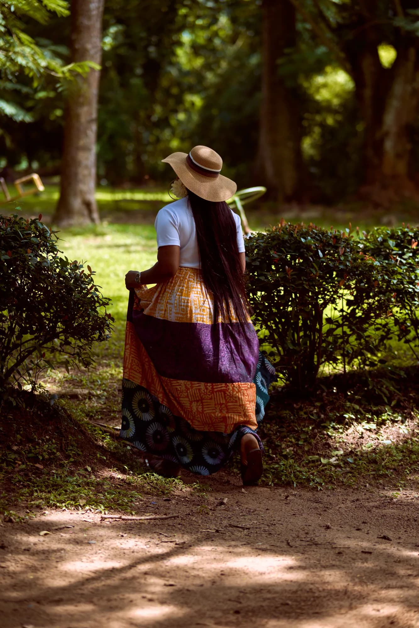 Ebahi walking a garden path